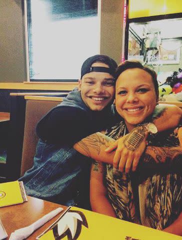 <p>Kane Brown Facebook</p> Kane Brown and his sister Heidi Swafford pose for a photo.
