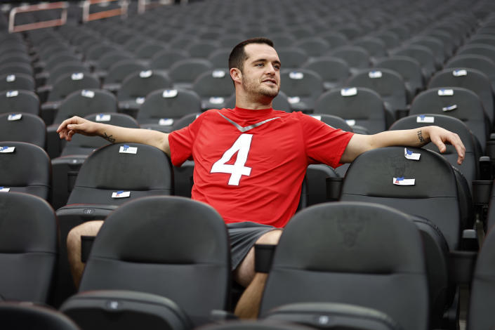 LAS VEGAS, NEVADA - FEBRUARY 04: AFC quarterback Derek Carr #4 of the Las Vegas Raiders reacts as he takes a seat during a group portrait prior to an NFL Pro Bowl football game at Allegiant Stadium on February 04, 2023 in Las Vegas, Nevada. (Photo by Michael Owens/Getty Images)