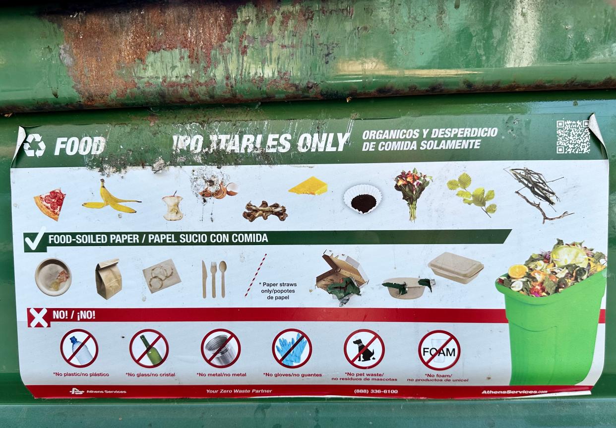 A large food waste recycling bin in Thousand Oaks, seen in August, shows images of pizza, a banana peel, egg shells and other acceptable items. Some residents of multifamily homes in Ventura County lack options for recycling organics.