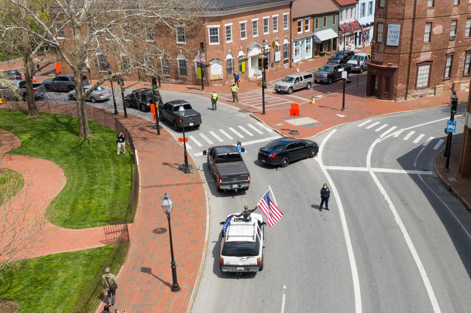 A caravan of cars that descended on the Maryland State House in Annapolis on April 18, protesting coronavirus-related restrictions. | Peter van Agtmael—Magnum Photos for TIME