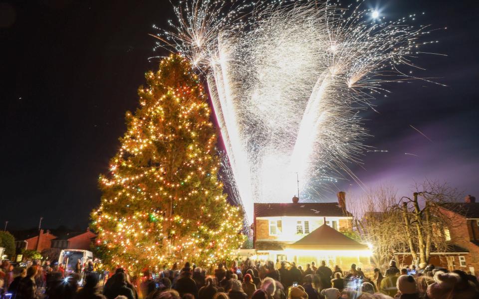 The Christmas tree in Inkberrow was lit up on Saturday - Anita Maric/SWNS