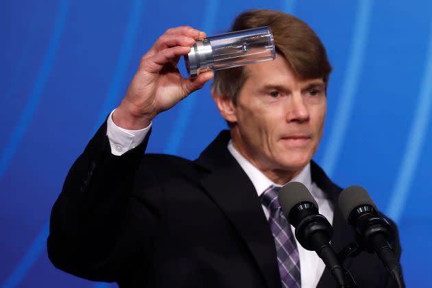 National Nuclear Security Administration Deputy Administrator for Defense Programs Dr. Marvin Adams holds up a cylinder he says is similar to one used by the Lawrence Livermore National Laboratories for a breakthrough in fusion research during a news conference at the Department of Energy headquarters on Dec. 13 in Washington, D.C.