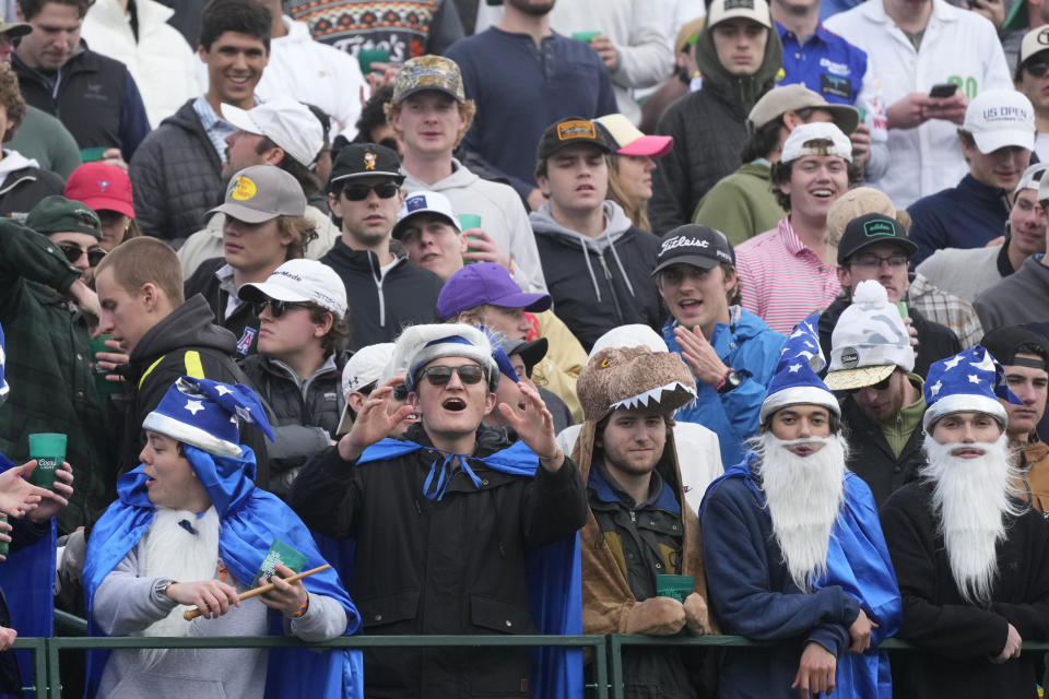 Just a few of the thousands in the gallery at the 16th hole during the continuation of the second round of the Phoenix Open golf tournament Saturday, Feb. 10, 2024, in Scottsdale, Ariz. (AP Photo/Ross D. Franklin)