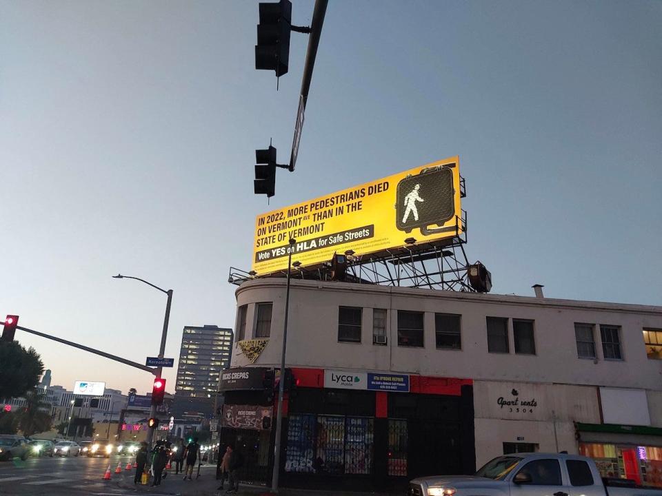 A billboard funded by a street safety non-profit, Streets for All, calls attention to pedestrian fatalities in Los Angeles.