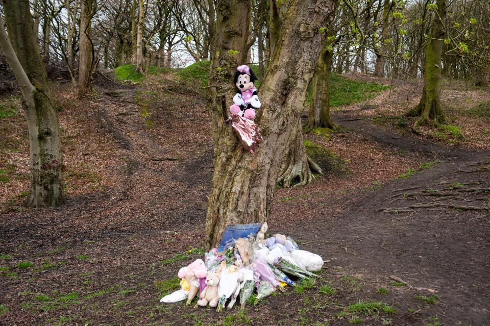 Flowers and toys have been left at the scene (Picture: Caters)