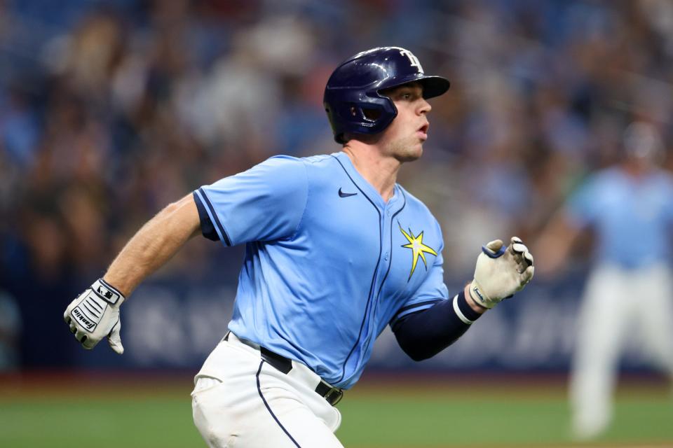 Tampa Bay catcher Ben Rortvedt hits an RBI double against Detroit during a game at Tropicana Field on April 24. Rortvedt is a Madison-area native.