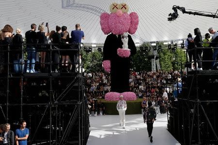 Models present creations by designer Kim Jones for Dior Homme collection as part of their Spring/Summer 2019 collection show during Men's Fashion Week in Paris, France, June 23, 2018. REUTERS/Pascal Rossignol