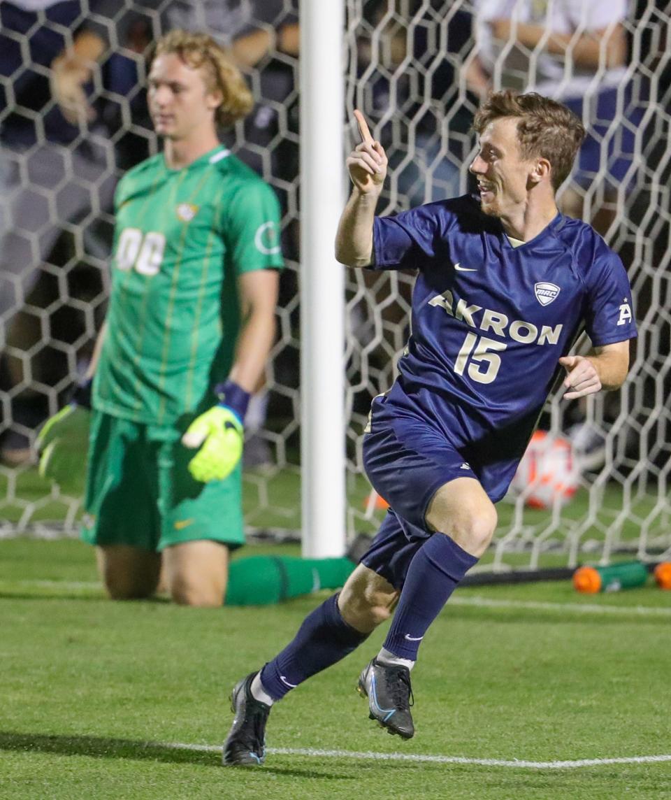 University of Akron's Johnny Fitzgerald celebrates his second half goal past VCU keeper John Ermini on Monday, Aug. 29, 2022 in Akron, Ohio, at FirstEnergy Stadium.