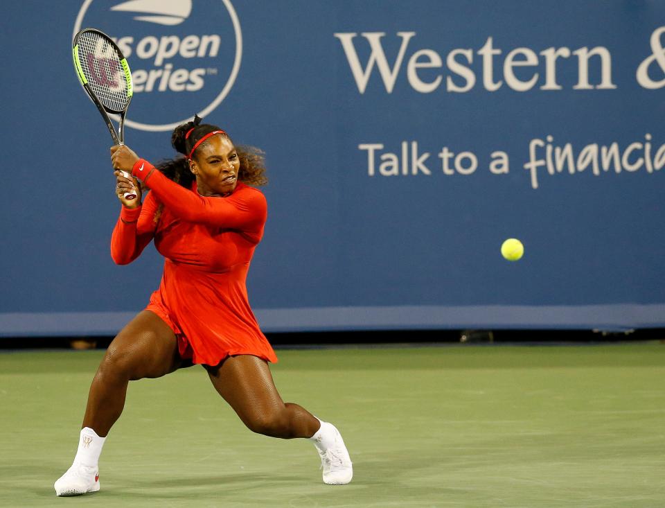 Serena Williams returns a serve in the first set of the match between Serena Williams and Petra Kvitova in the second round of the Western & Southern Open at the Lindner Family Tennis Center in Mason, Ohio, on Tuesday, Aug. 14, 2018. Williams was eliminated by the 8-seeded Kvitova, 6-3, 2-6, 6-3.