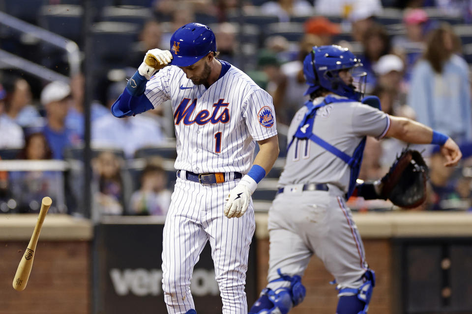 New York Mets' Jeff McNeil reacts after striking out against the New York Mets during the first inning of a baseball game Tuesday, Aug. 29, 2023, in New York. (AP Photo/Adam Hunger)