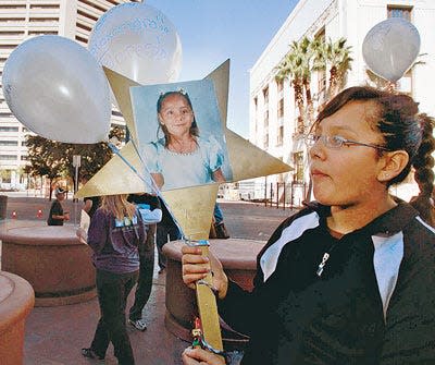 The abduction and murder of 5-year-old Alexandra Flores while shopping with her family in November 2001 is considered one of El Paso's most disturbing crimes. This file photo shows her sister holding a star in memory of Alexandra during a healing victims walk in 2007. Alejandra's killer is scheldued to be excuted today.