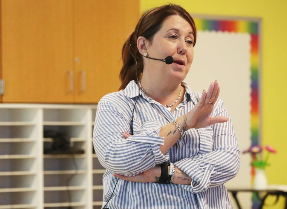 Fifth grade teacher Sara Wilkerson talks to her class at Helen Arnold Community Learning Center in Akron.