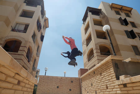 Egyptian women from Parkour Egypt "PKE" practice their parkour skills around buildings on the outskirts of Cairo, Egypt July 20, 2018. REUTERS/Amr Abdallah Dalsh