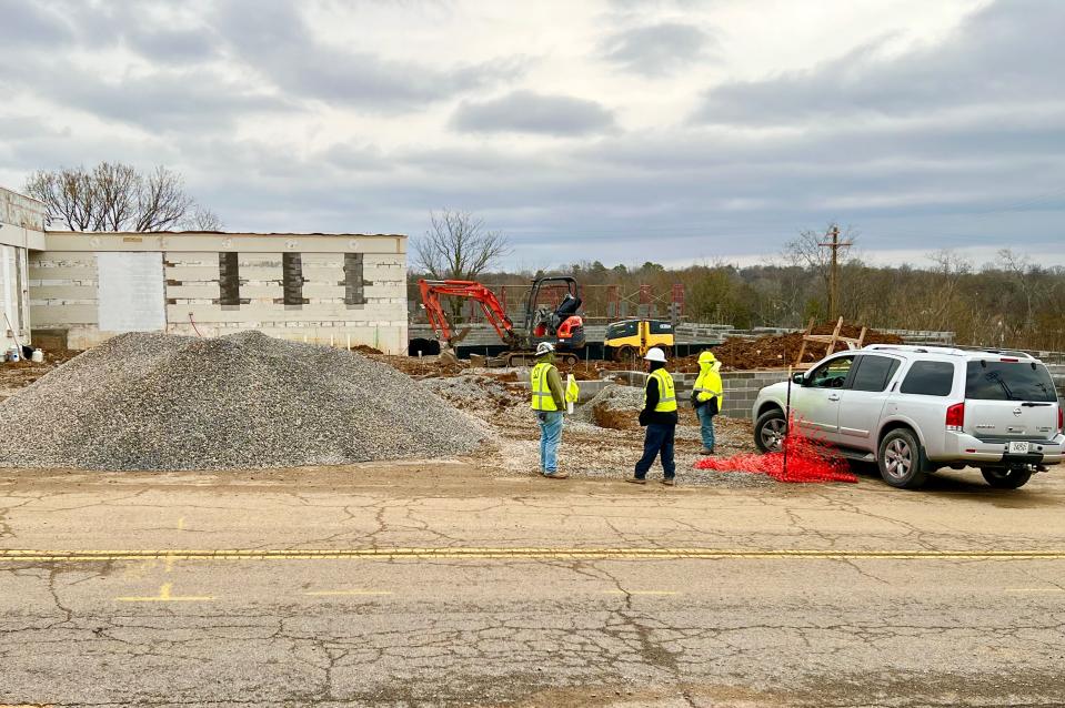 Construction crews work on planned expansions to the Maury County Archives, one of many construction projects currently underway along East 6th Street.