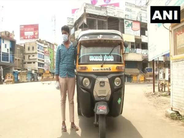 Akash Denur the young auto-rickshaw driver in Kalaburagi who offers free services amid the pandemic. (Photo/ANI)