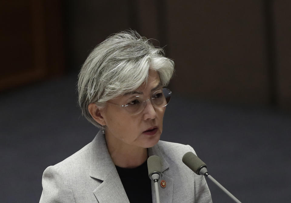 FILE - In this Tuesday, July 9, 2019, file photo, South Korean Foreign Minister Kang Kyung-wha answers questions during a plenary session at National Assembly in Seoul, South Korea. South Korea said Thursday, July 11, 2019, Kang discussed the issue with U.S. Secretary of State Mike Pompeo by phone and conveyed Seoul's view that Japan's "undesirable" trade curbs could disrupt global supply chains and hurt trilateral cooperation among the countries. (AP Photo/Lee Jin-man, File)