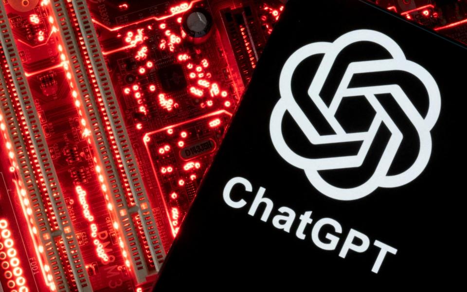 FILE PHOTO: A smartphone with a displayed ChatGPT logo is placed on a computer motherboard in this illustration taken February 23, 2023. REUTERS/Dado Ruvic/Illustration/File Photo - DADO RUVIC/REUTERS