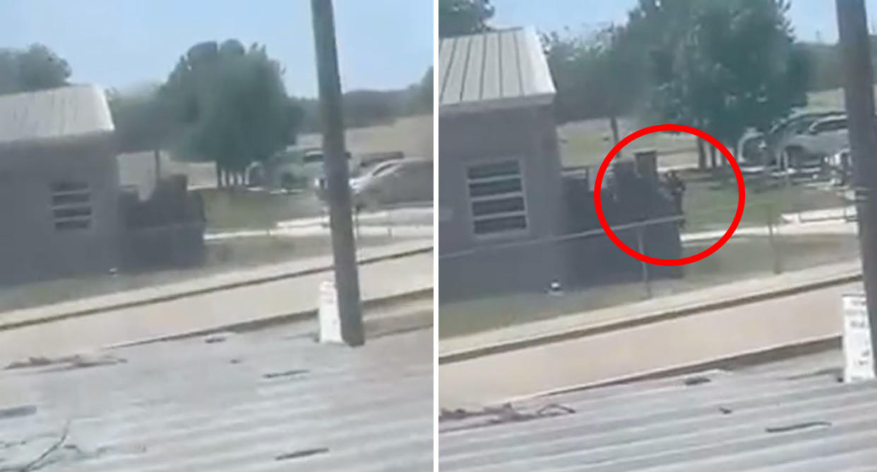 Unverified video from the school appears to show a man lurking behind one of the buildings at the school in Uvalde, Texas. Source: Facebook