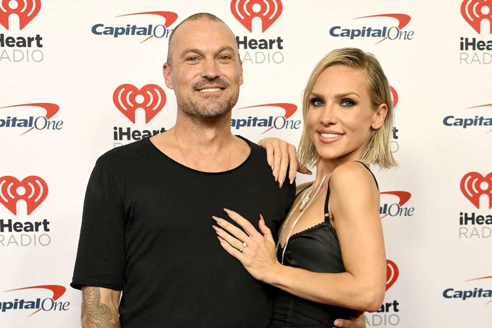 <p>Stephen Greathouse/Shutterstock </p> Brian Austin Green and Sharna Burgess at the iHeartRadio Music Festival in Las Vegas, Nevada on 22 Sep