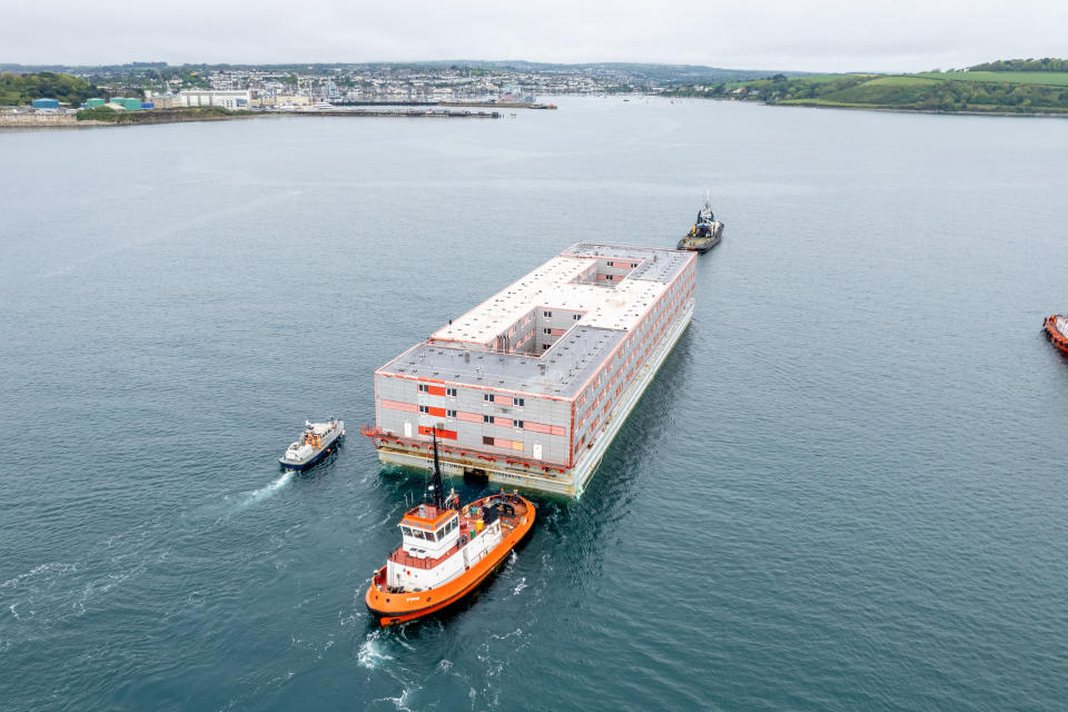 Around 500 people will live on the barge, while port officials are reportedly concerned about protests from far-right groups. (PA)