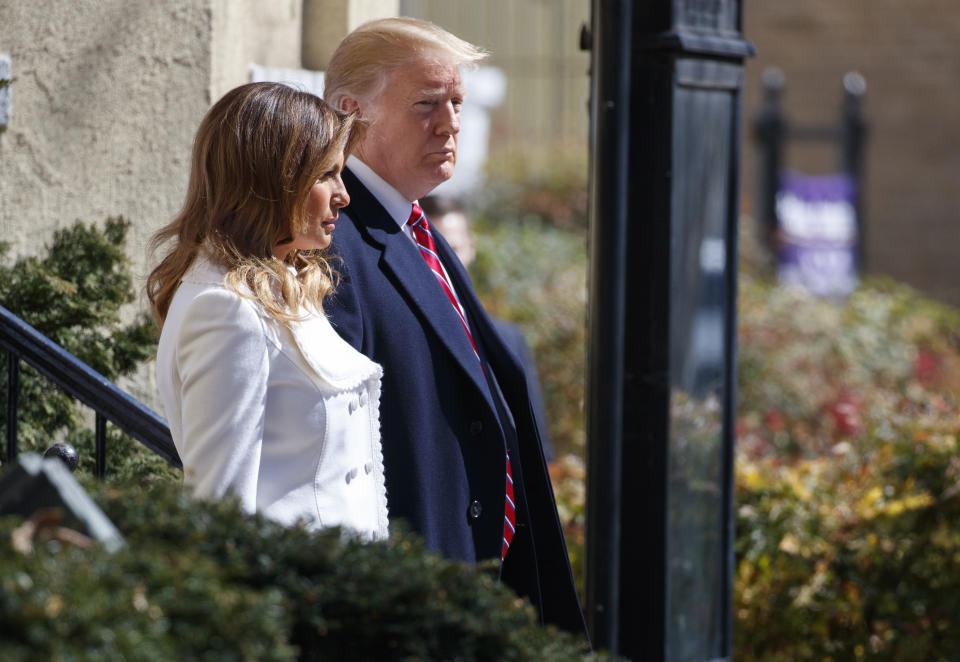 President Donald Trump and first lady Melania Trump walk to their motorcade after attending service at Saint John's Church in Washington, Sunday, March 17, 2019, en route to the White House. (AP Photo/Carolyn Kaster)
