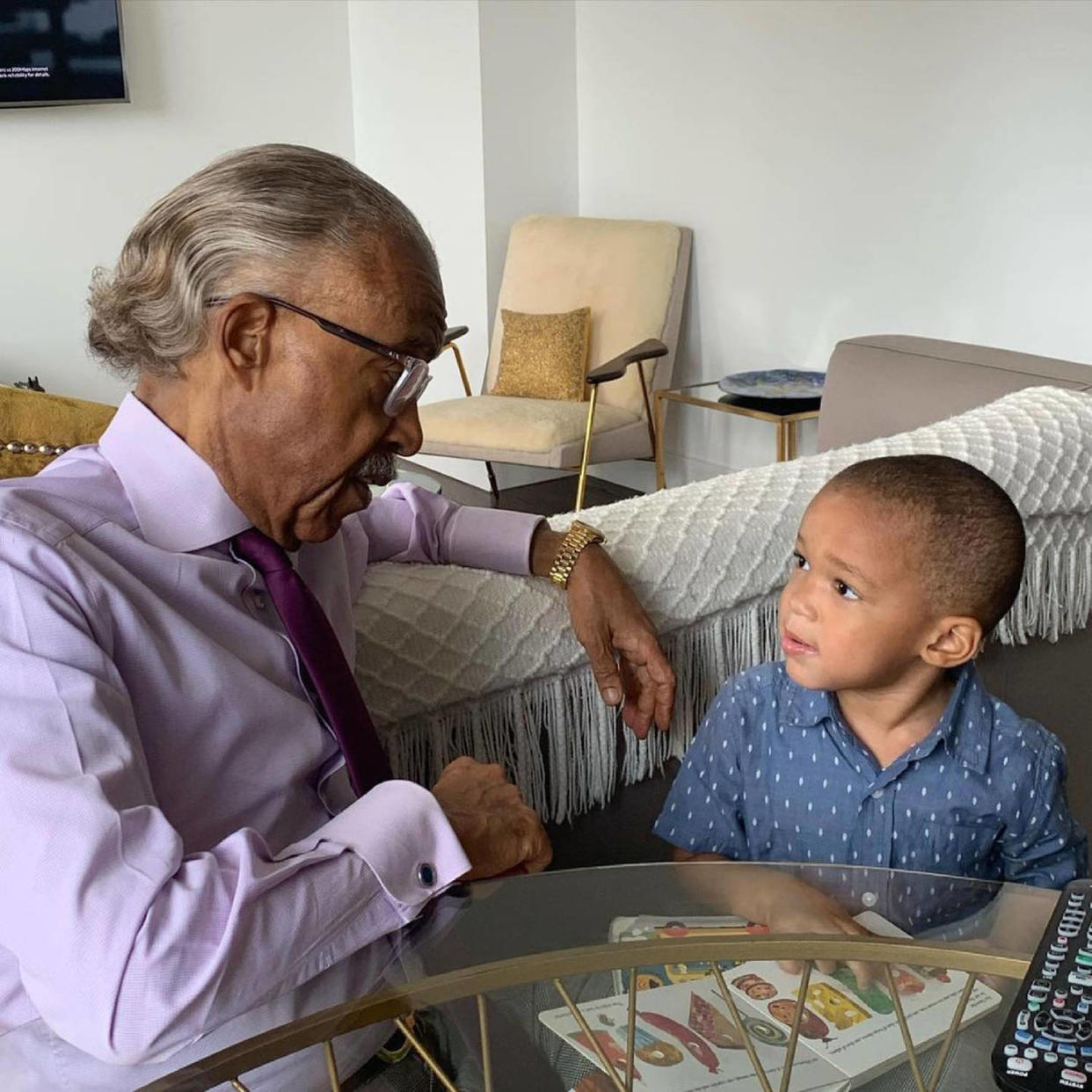 Al Sharpton and his grandson (@mr_marcusal via Instagram)