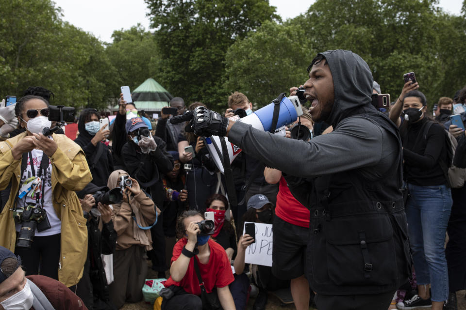 LONDON, ENGLAND - JUNE 03: Actor John Boyega speaks to the crowd during a Black Lives Matter protest in Hyde Park on June 3, 2020 in London, United Kingdom. The death of an African-American man, George Floyd, while in the custody of Minneapolis police has sparked protests across the United States, as well as demonstrations of solidarity in many countries around the world. (Photo by Dan Kitwood/Getty Images)