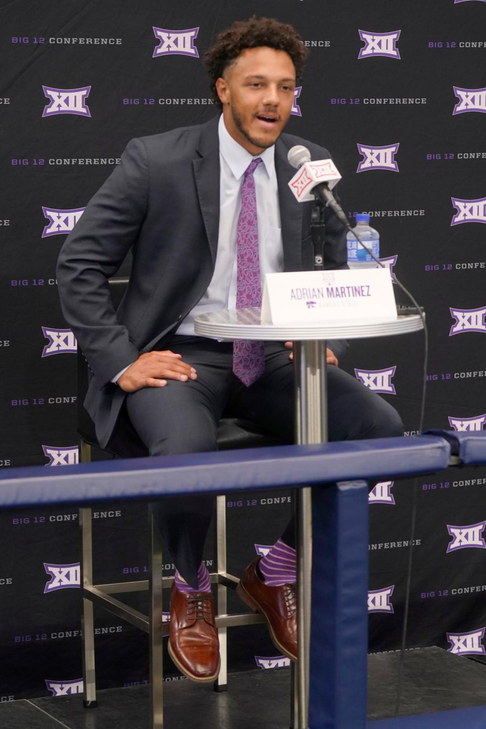 New Kansas State quarterback Adrian Martinez, a graduate transfer from Nebraska, speaks to reporters Wednesday during Big 12 media days at AT&T Stadium in Arlington, Texas.