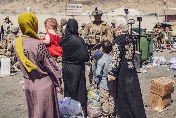 PHOTO: U.S. Marines with the 24th Marine Expeditionary Unit process evacuees as they go through the Evacuation Control Center during an evacuation at Hamid Karzai International Airport, Kabul, Afghanistan, Aug. 28. (Staff Sgt. Victor Mancilla/U.S. Marine Corps)