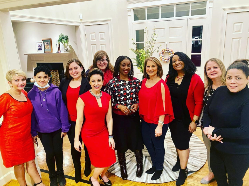 Cynthia Benjamin, third from right, director of audience engagement and trust for the USA TODAY Network, joined the Go Red for Women heart health campaign in Rochester, N.Y., to improve her personal heart health. Melisza Campos of Wegmans, fourth from left in front, is the team lead.