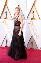 <p>Leslie Bibb stuns in a sheer black gown.</p>