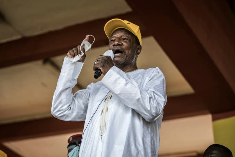 Le président guinéen Alpha Condé pendant la campagne présidentielle à Conakry, le 16 octobre 2020 - JOHN WESSELS © 2019 AFP