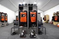 <p>A general view of the Philadelphia Flyers locker room is seen prior to the 2021 NHL Outdoors Sunday presented by Honda between the Philadelphia Flyers and the Boston Bruins on the 18th fairway of the Edgewood Tahoe Resort, at the south shore of Lake Tahoe on February 21, 2021 in Stateline, Nevada. (Photo by Brian Babineau/NHLI via Getty Images)</p> 