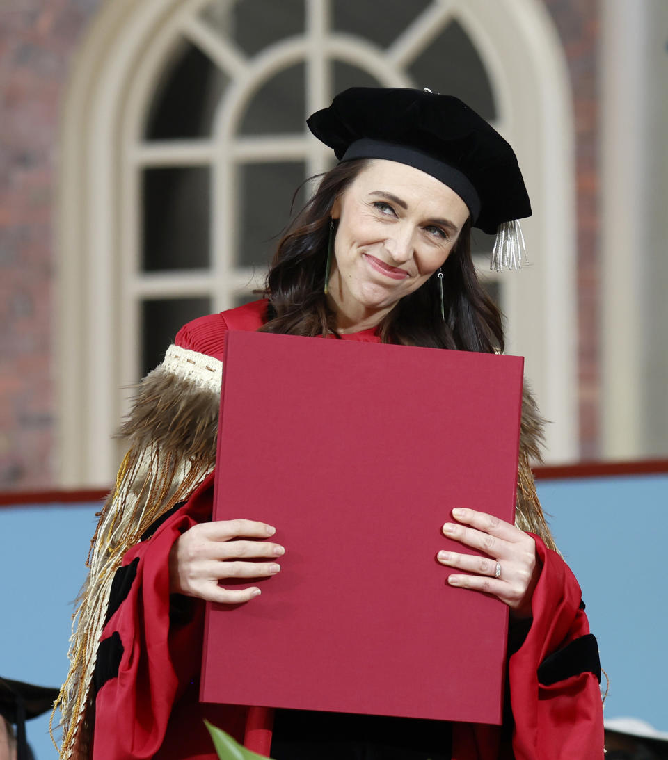 New Zealand Prime Minister Jacinda Ardern reacts after receiving an honorary degree before speaking at Harvard's 371st Commencement, Thursday, May 26, 2022, in Cambridge, Mass. (AP Photo/Mary Schwalm)