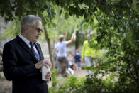 District attorney Larry Krasner talks to volunteers before they canvas around the Fairmount neighborhood in Philadelphia, on Sunday, May 16, 2021. Voters will cast ballots Tuesday, May 18 in the Democratic Primary for Philadelphia District Attorney that pits reform-minded incumbent Krasner against veteran homicide prosecutor Carlos Vega, likely deciding the future of the office in the overwhelmingly Democratic city. (David Maialetti/The Philadelphia Inquirer via AP)