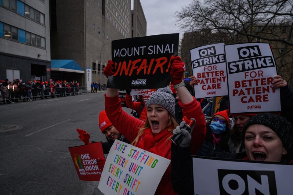 Nurses protest against low wages and staffing levels, during a strike outside the Mount Sinai hospital in New York (AFP via Getty Images)