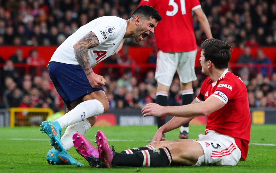 Harry Maguire of Manchester United scores an own goal during the Premier League match between Manchester United and Tottenham Hotspur at Old Trafford on March 12 - James Gill - Danehouse/Getty Images