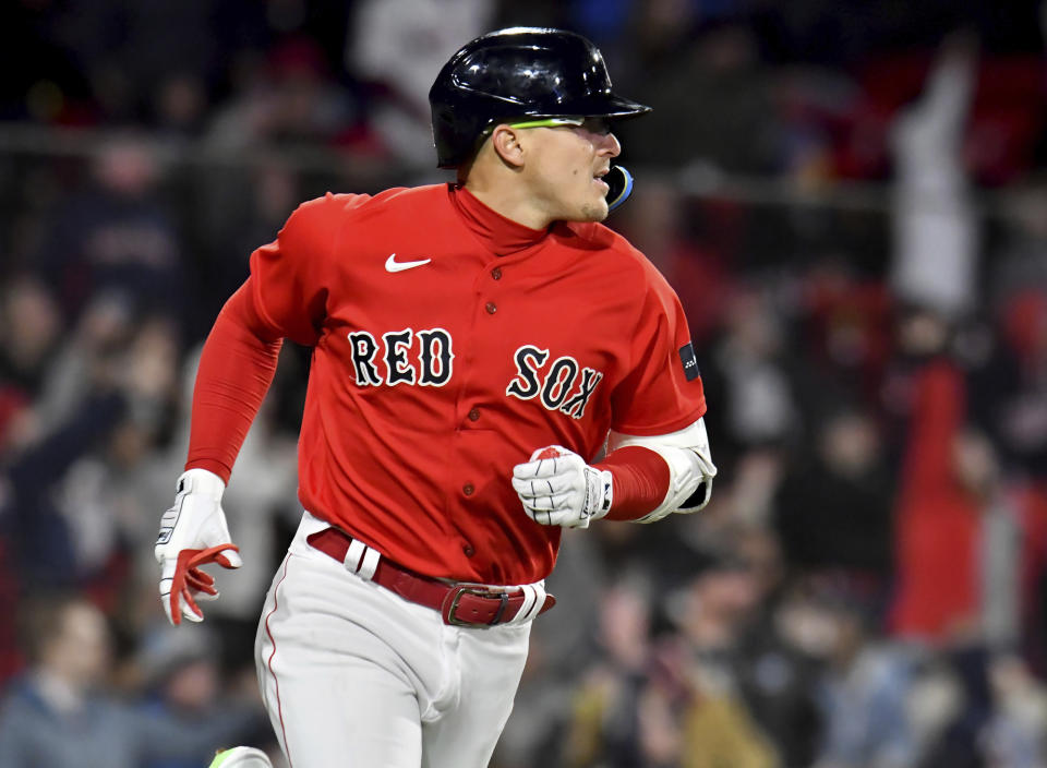 Boston Red Sox's Enrique Hernandez runs the bases after hitting a home run against the Minnesota Twins during the sixth inning of a baseball game Wednesday, April 19, 2023, in Boston. (AP Photo/Mark Stockwell)