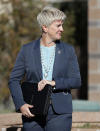 Santa Fe District Attorney Mary Carmack-Altwies looks at her team after a joint news conference with Santa Fe County Sheriff Adan Mendoza in Santa Fe, N.M., Wednesday, Oct. 27, 2021. New Mexico authorities said Wednesday they have recovered a lead projectile believed to have been fired from the gun used in the fatal movie-set shooting. (AP Photo/Andres Leighton)