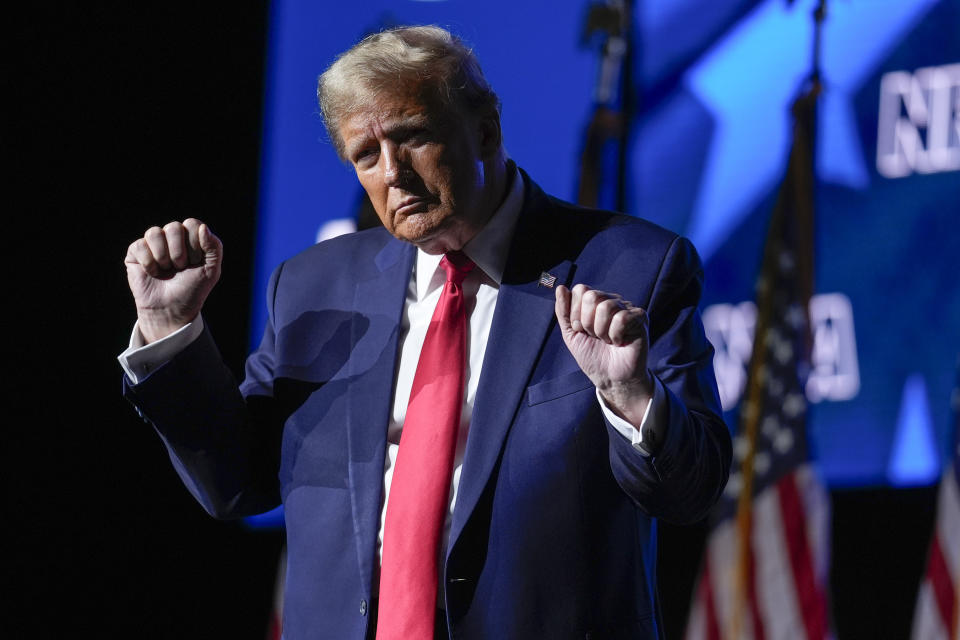 Republican presidential candidate former President Donald Trump dances after speaking at the National Rifle Association's Presidential Forum in Harrisburg, Pa., Friday, Feb. 9, 2024. (AP Photo/Matt Rourke)