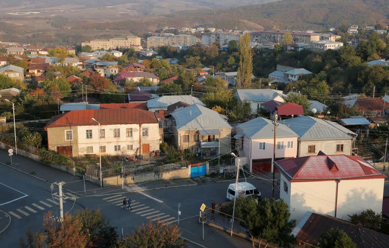 FILE PHOTO: People cross a street in Stepanakert