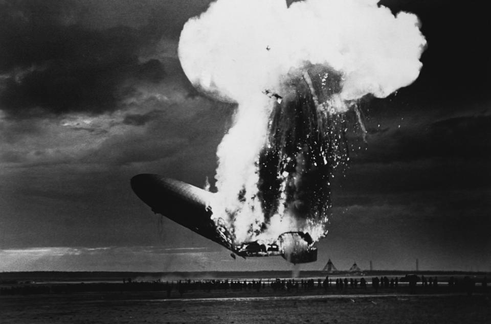 American history photograph shows the explosion of the airship Hindenburg upon docking at Lakehurst, New Jersey on May 6, 1937.