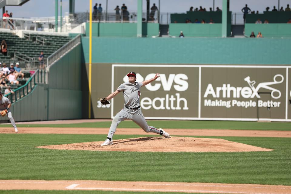 Northeastern University pitcher James Quinlivan delivers to the plate during the Huskies' exhibition game against the Boston Red Sox on Feb. 24, 2023, at JetBlue Park in Fort Myers, Florida.