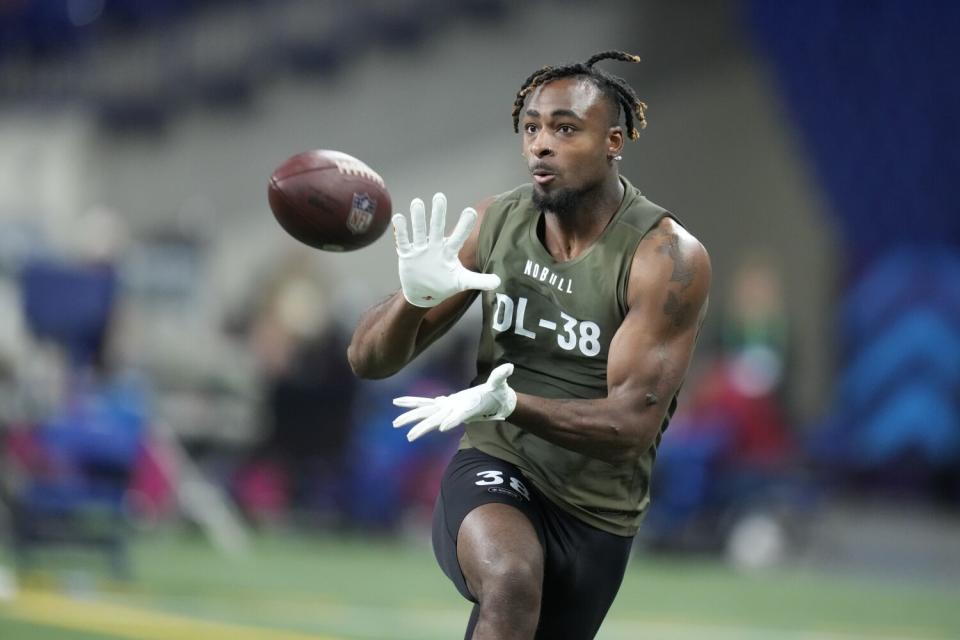 Iowa State defensive lineman Will McDonald IV takes part in drills at the NFL Scouting Combine in March.