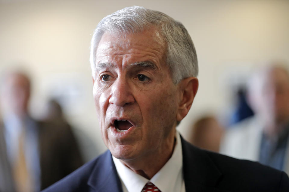 Louisiana's Republican gubernatorial candidate Eddie Rispone greets supporters and talks to media on a campaign stop at New Orleans International Airport in Kenner, La., Monday, Nov. 4, 2019. Rispone says a radio ad linking him and President Donald Trump to former Ku Klux Klan leader David Duke is "disgusting." Rispone is blaming Democratic incumbent John Bel Edwards for the advertising by the New Orleans-based Black Organization for Leadership Development. There's no evidence Edwards is connected to the effort. (AP Photo/Gerald Herbert)