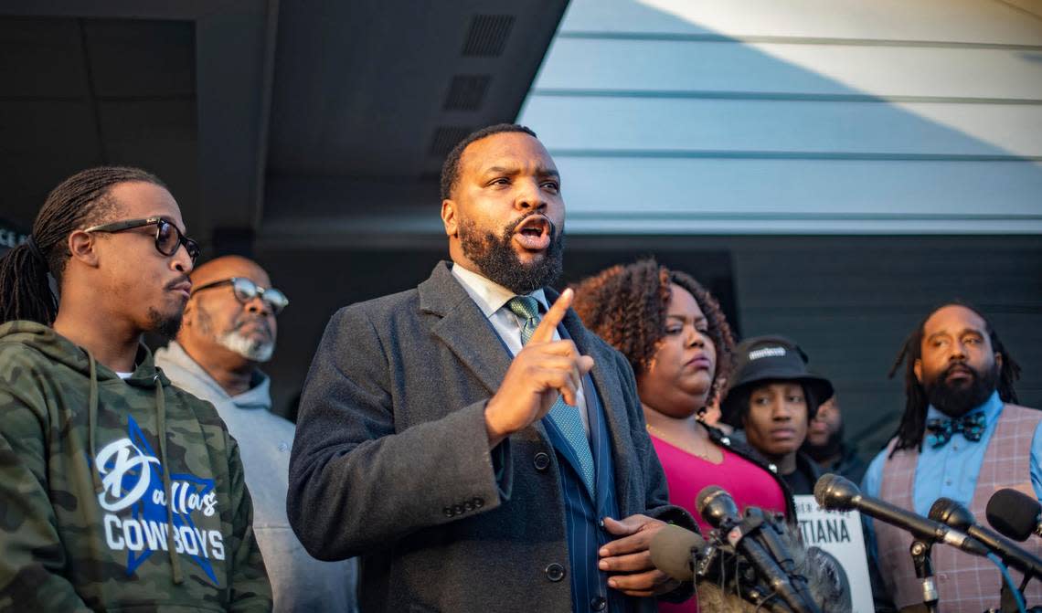 Lee Merritt speaks at a press conference with Ashley Carr, Atatiana Jefferson’s sister, at their mother’s house in Fort Worth on Tuesday, Dec. 20, 2022. Jefferson was fatally shot at the house by Fort Worth police officer Aaron Dean in October 2019. Their mother died three months later.
