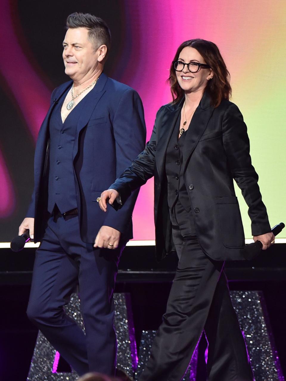 Nick Offerman and Megan Mullally walk onstage during the 2022 Film Independent Spirit Awards on March 06, 2022 in Santa Monica, California