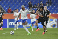 Yokohama F. Marinos' Anderson Lopes, left, is blocked by Ulsan Hyundai's Ko Seung-beom during the first leg of the AFC Champions League semifinal soccer match at the Ulsan Munsu Football Stadium in Ulsan, South Korea, Wednesday, April 17, 2024. (AP Photo/Ahn Young-joon)