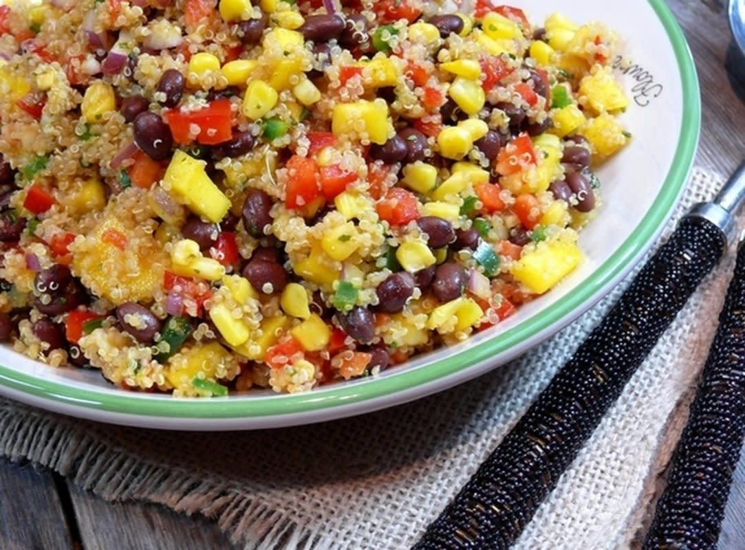 <p>Noble Pig</p><p>Light and healthy this colorful Southwestern Black Bean, Quinoa and Mango Medley salad is full of vitamins. It is the perfect healthy choice! Get the recipe for <strong><a href="https://noblepig.com/2012/12/southwestern-black-bean-quinoa-and-mango-medley/" rel="nofollow noopener" target="_blank" data-ylk="slk:Southwestern Black Bean, Quinoa and Mango Medley;elm:context_link;itc:0;sec:content-canvas" class="link rapid-noclick-resp">Southwestern Black Bean, Quinoa and Mango Medley</a></strong>.</p>