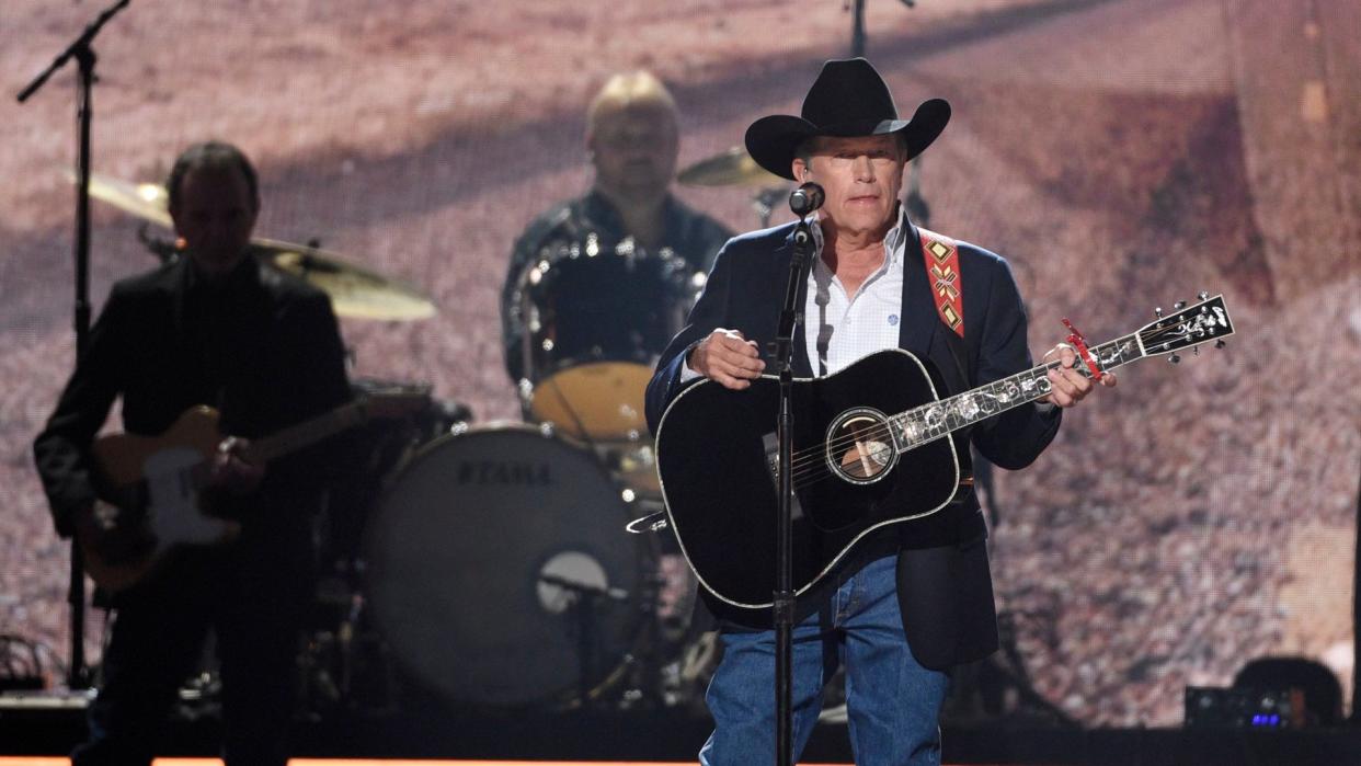 Mandatory Credit: Photo by Chris Pizzello/Invision/AP/Shutterstock (10190041ak)George Strait performs "God and Country Music" at the 54th annual Academy of Country Music Awards at the MGM Grand Garden Arena, in Las Vegas54th Annual Academy of Country Music Awards - Show, Las Vegas, USA - 07 Apr 2019.
